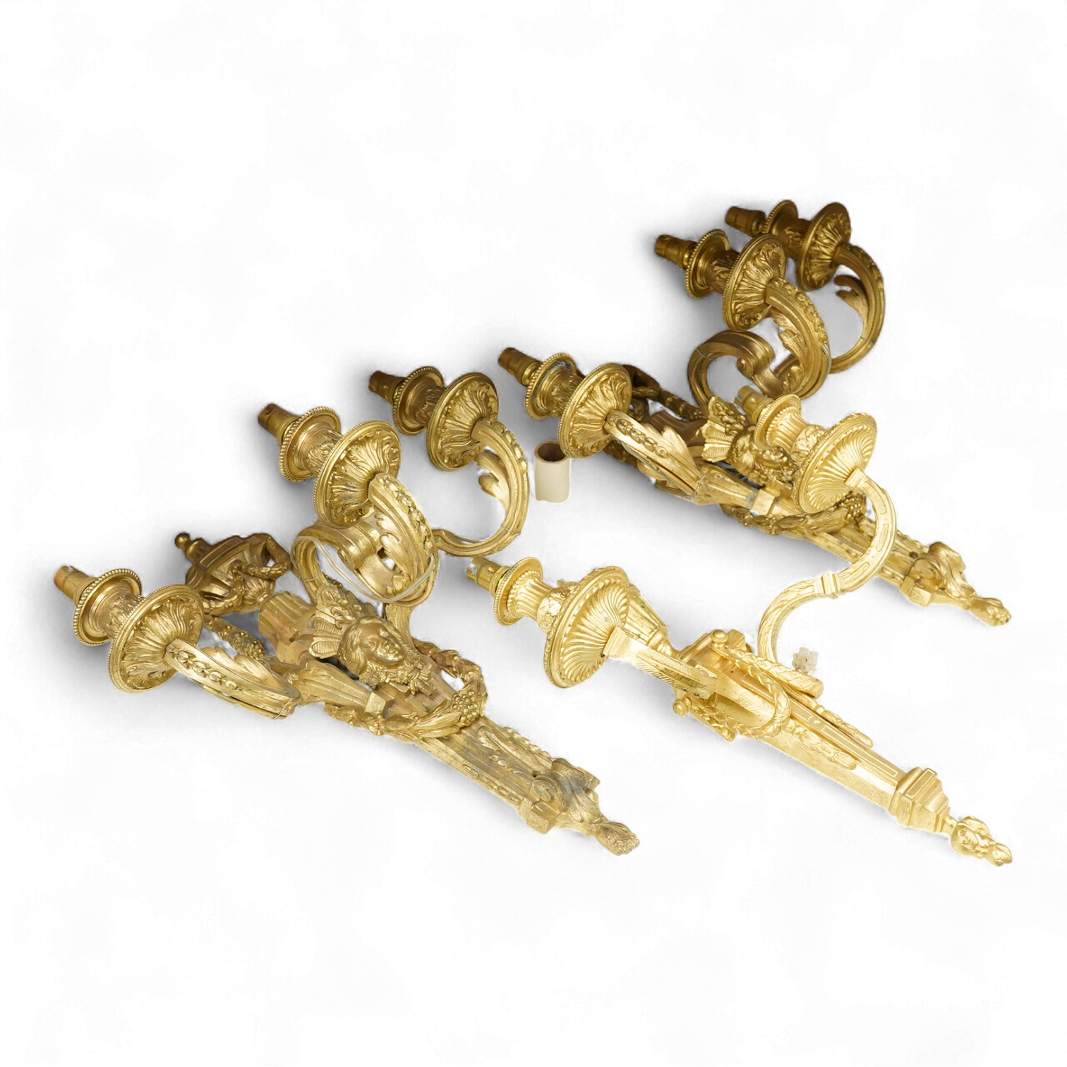 A pair of Adam style cast brass three branch wall sconces - 36cm high, with similar two branch sconce